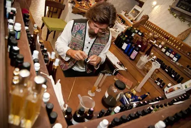 A perfumer's organ with hundreds of ingredient bottles.